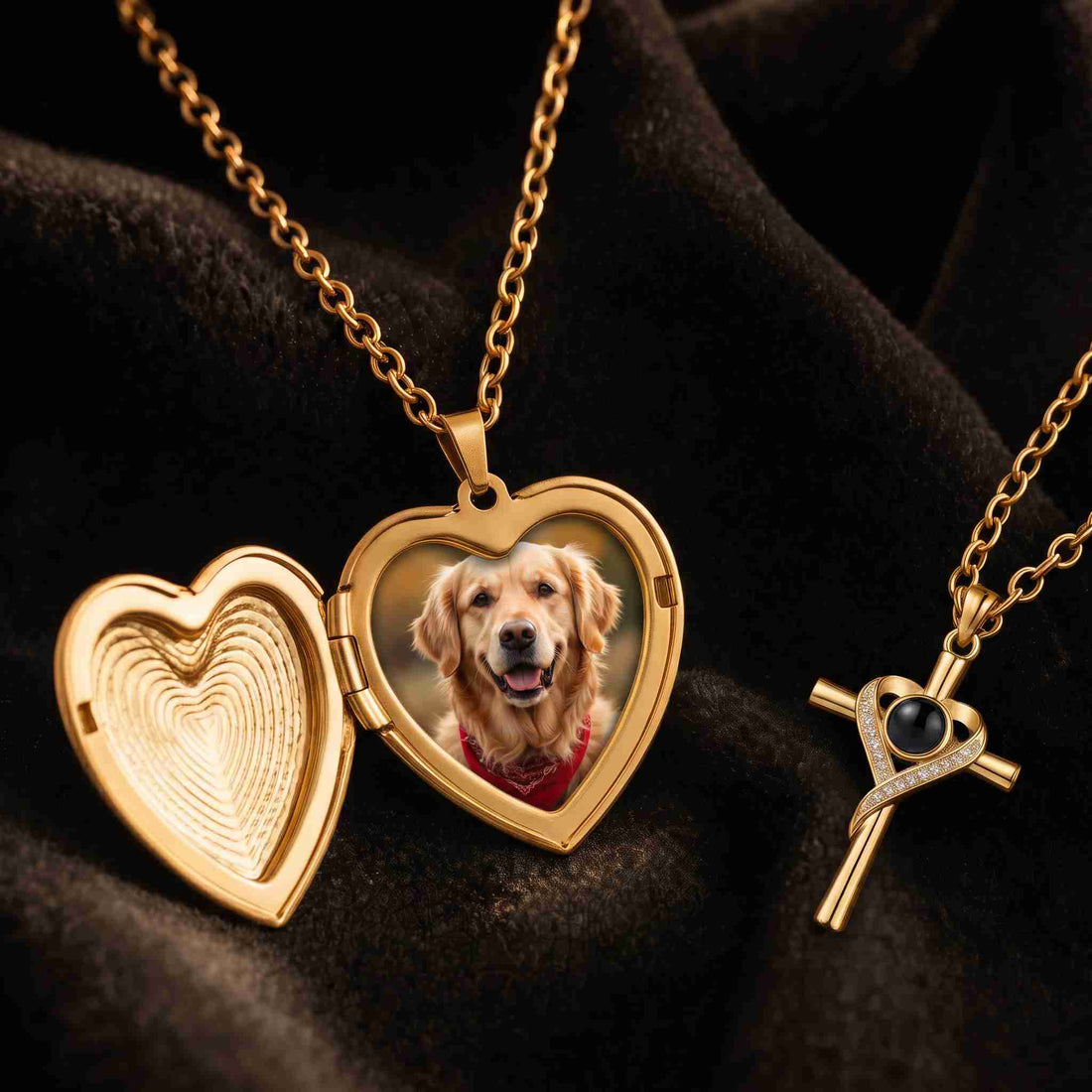 An open photo locket holding a printed photograph beside a photo projection pendant with a dark lens, both resting on dark velvet
