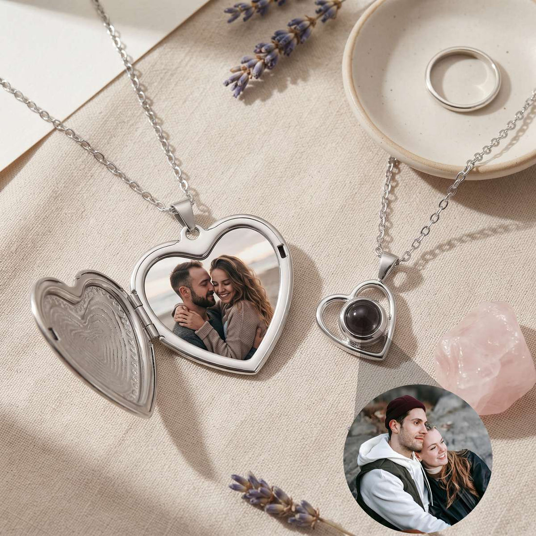 A projection pendant and an open photo locket with a small printed photo inside, side by side on a flaxen surface